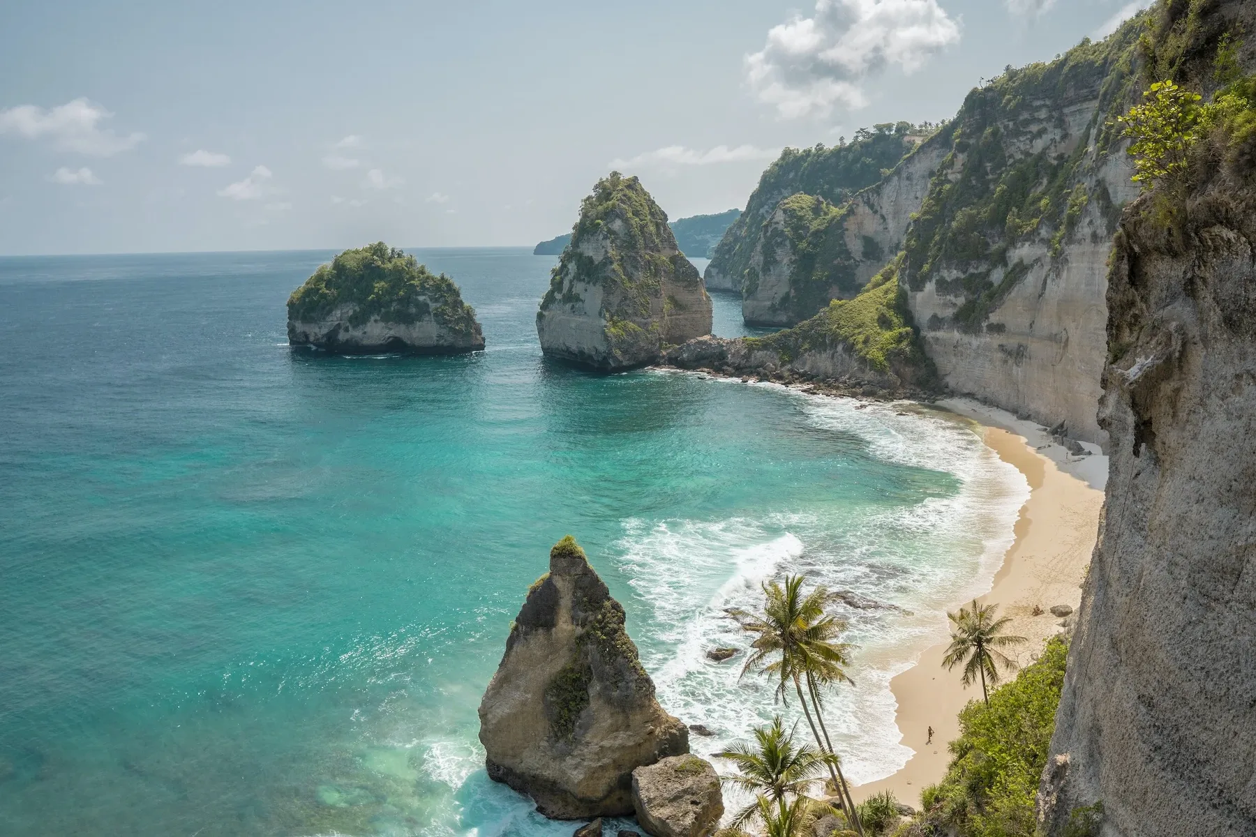 Limestone cliffs and turquoise coastline at golden hour